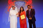 His Excellency Ahmad Bin Abdul Aziz Al Shehhi(Under Secretary-UAE Ministry of Economy)awarding Lillete Dubey at the launch of PowerBrands Rising Stars 2012-13 in Dubai on 29th Aug 2012.jpg